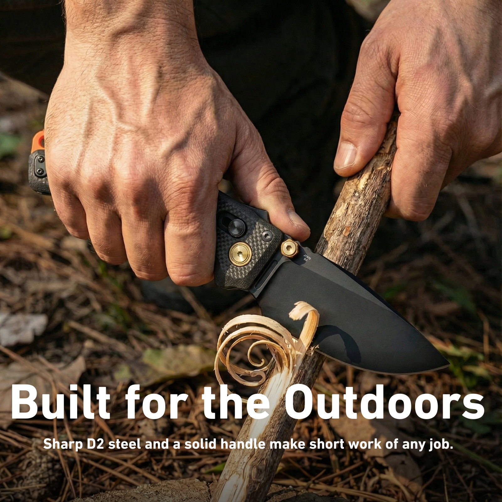 CJRB Doubletap tactical knife sitting on a wooden workbench next to heavy-duty gloves
