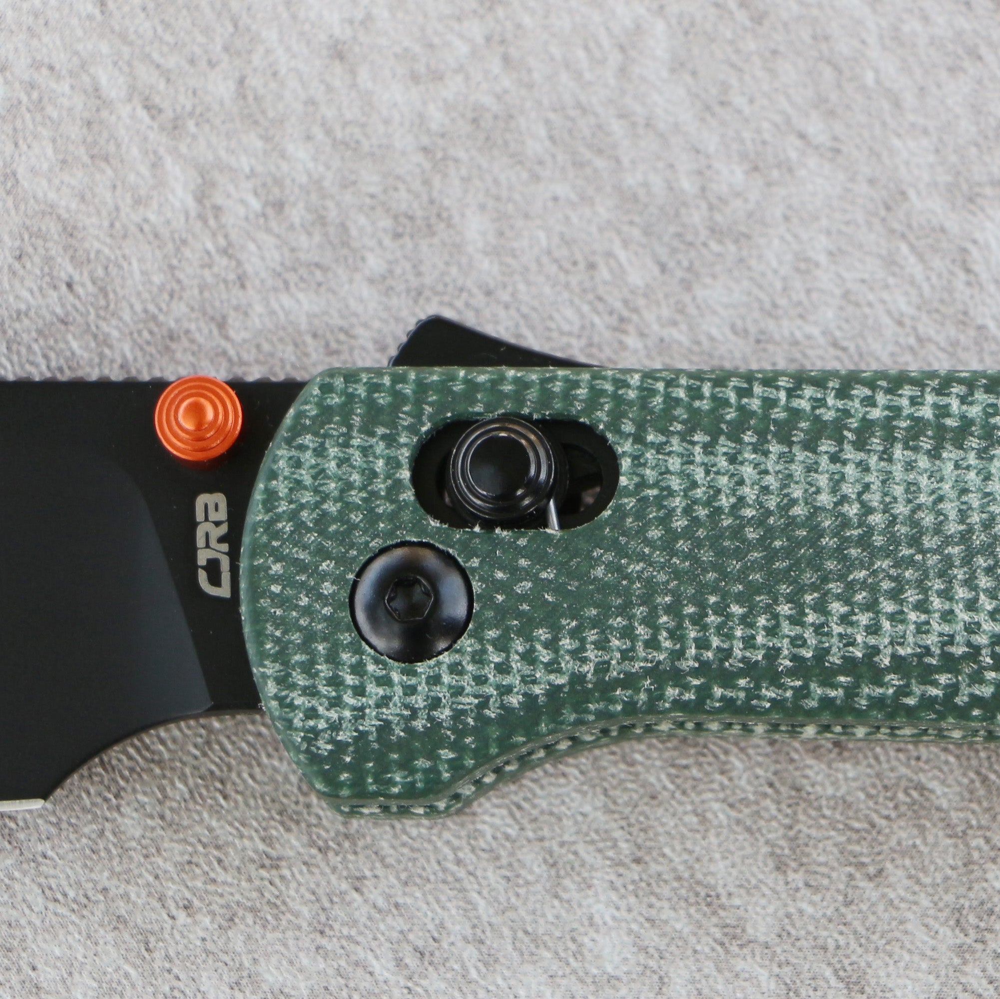 CJRB Bolt Thumb Stud & Recoil Lock V2 Folding Knife Green Micarta Hand